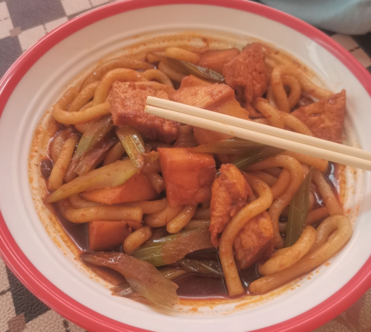 古丽辣新疆炒米粉的图标